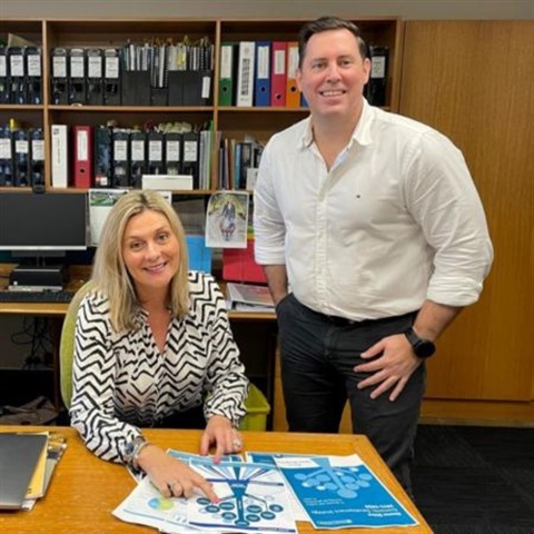 Picture of Mayor Clare Stewart and CEO Scott Waters with the strategy document