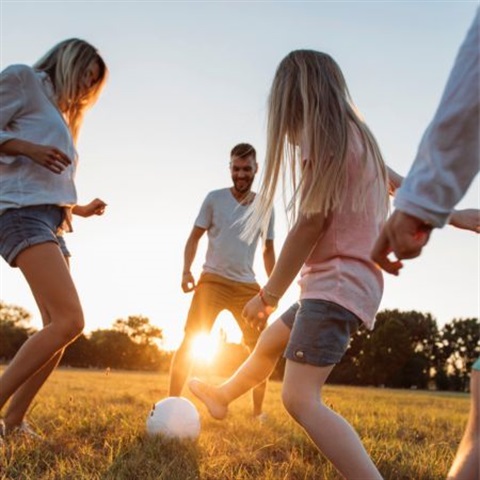 People kicking a ball